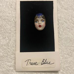 Vintage Adagio True Blue ceramic face brooch